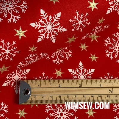 .100% Cotton Print em130255 White Snowflakes with Gold Glitter Stars on Red BG - 1m or 0.5m