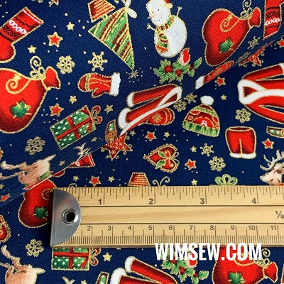 .100% Cotton Print em973 Christmas Mix on Blue BG - 1m or 0.5m